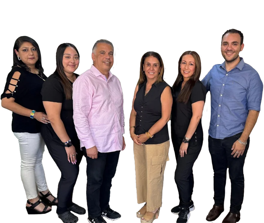 A team photo of dentists Kamran Rafie, Shadi Khoshbin, and Jonathan Akhavan with their staff